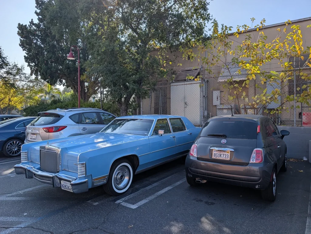 Wild photos show just how big a classic Lincoln Continental is compared to all other cars that aren't American land yachts