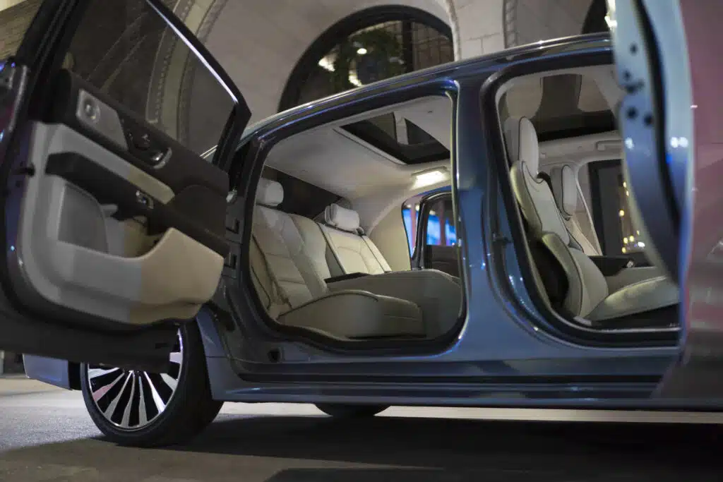 This American luxury sedan brings Rolls-Royce's coolest feature, coach doors, suicide doors, Lincoln Continental, and luxury car design to buyers for $80K