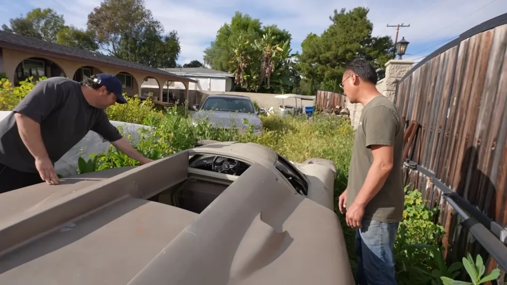 Emelia Hartford finds abandoned Lola T70 kit car hidden in overgrowth and missing major components but still wants to buy it
