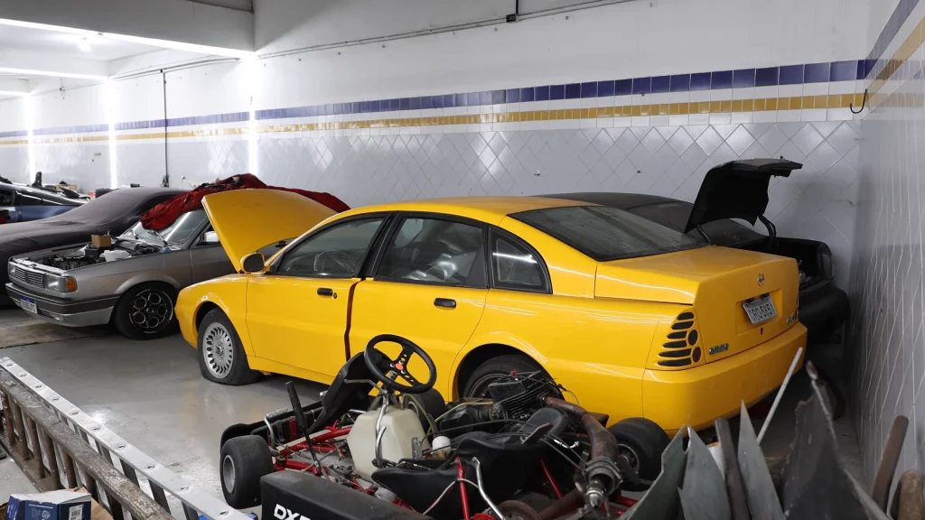 A private car collector and drift legend have built a real life Iron Man garage to house a one of 12 Frankenstein Lotus built exclusively from scrap engines
