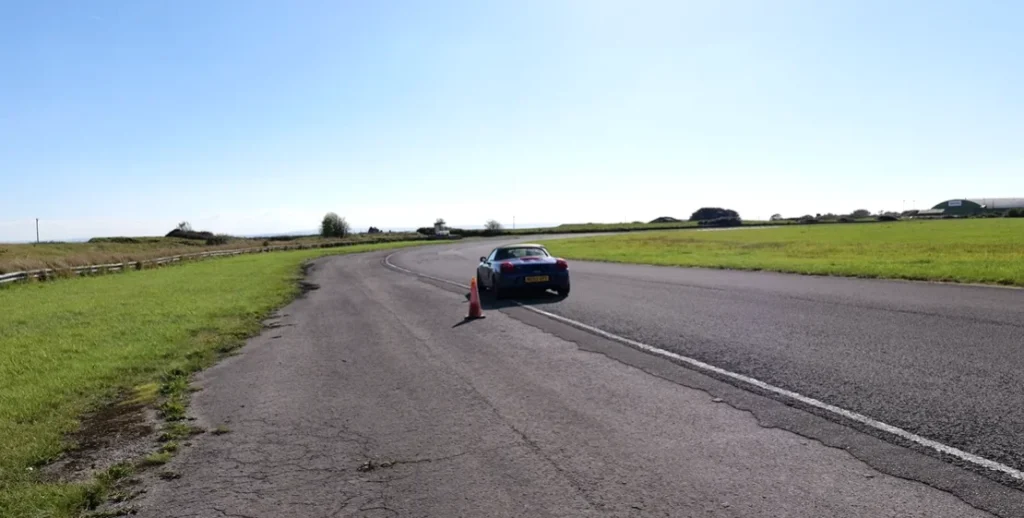 Man mods the hell out of $669 car to try and get it to beat $26,750 sports car on a racetrack