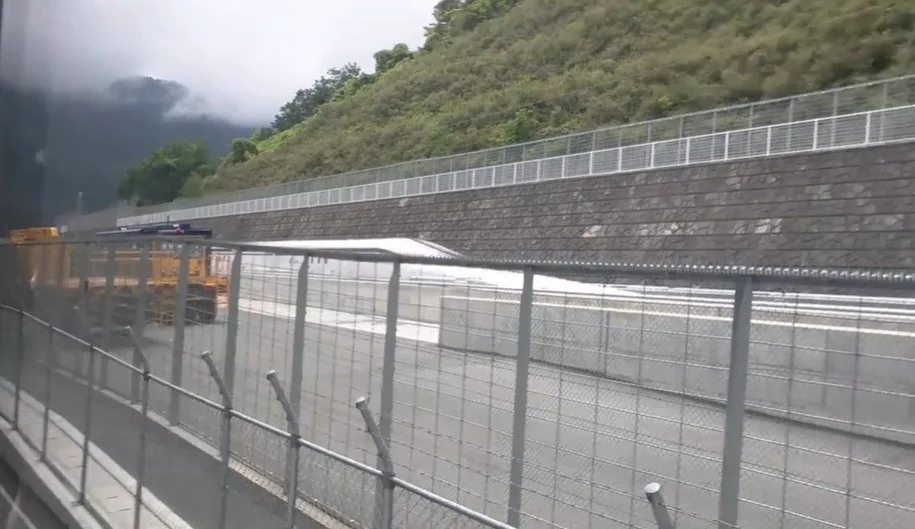Breathtaking footage shows Japanese maglev train whizzing past at 310mph like a bullet while a crowd looks on stunned