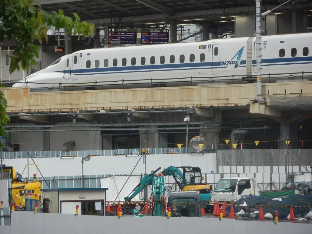 Breathtaking footage shows Japanese maglev train whizzing past at 310mph like a bullet while a crowd looks on stunned