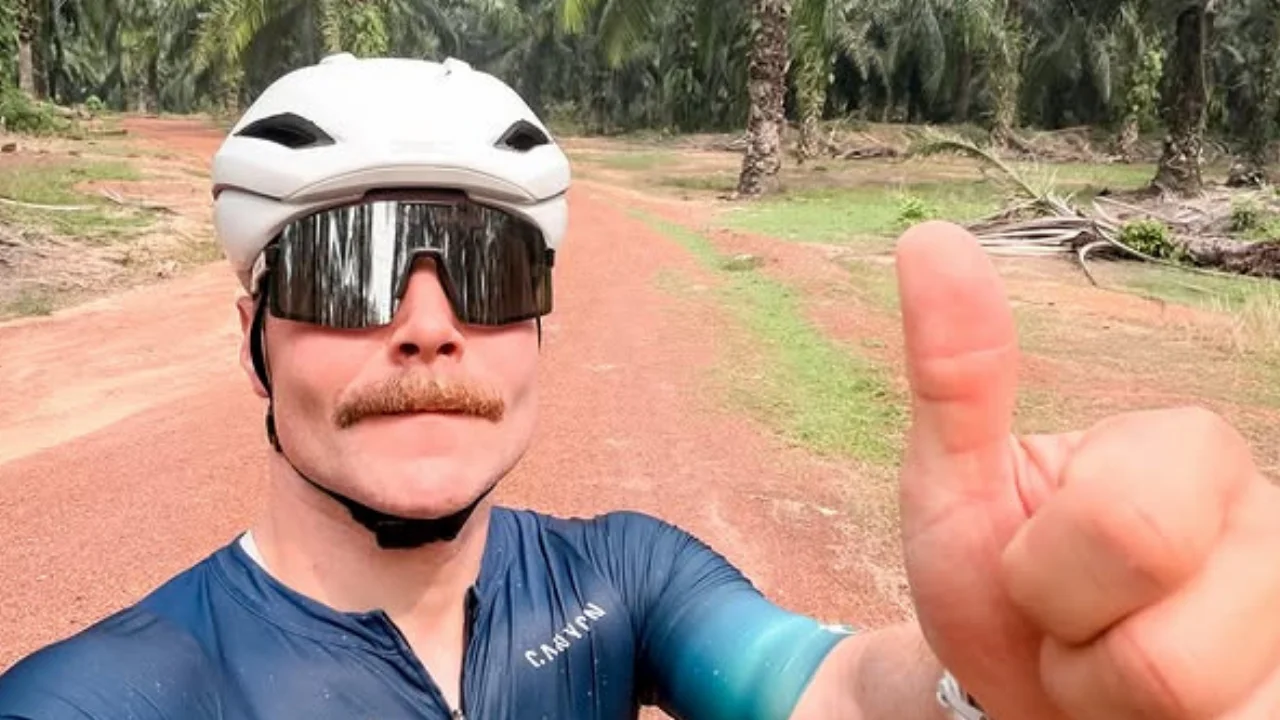 F1 driver Valtteri Bottas cycles 260 miles from Malaysia to Singapore instead of flying between race weekends