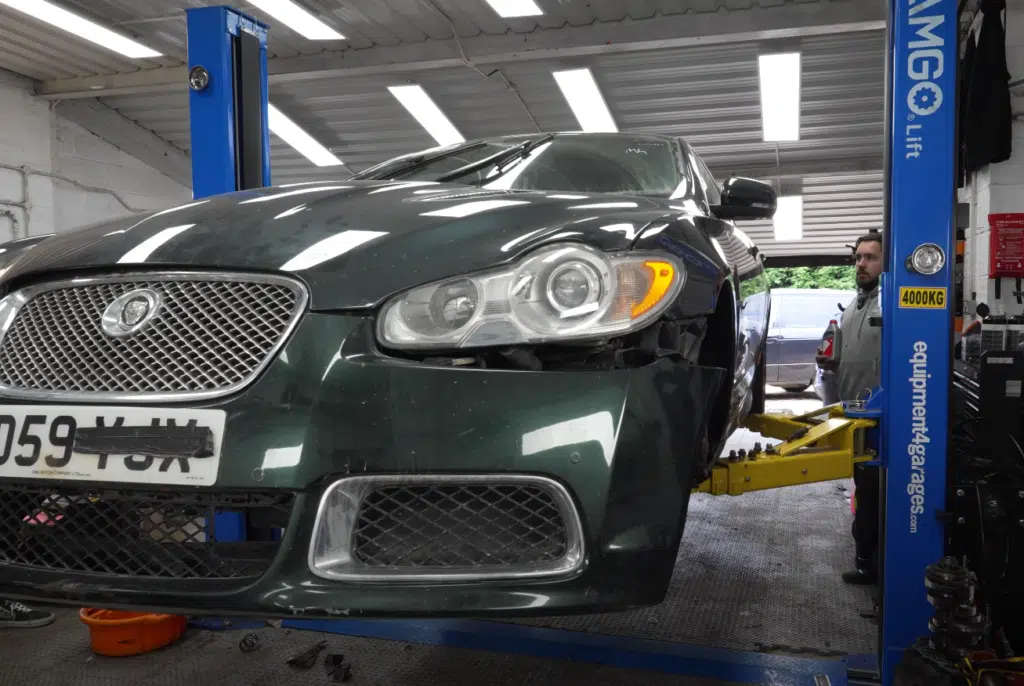 This Jaguar XFR was a crash-damaged car and risky salvage rebuild Through expert car restoration, it’s now running again and ready for a second chance