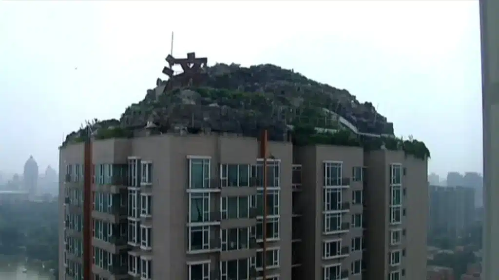 Man builds a mountaintop mansion on a skyscraper