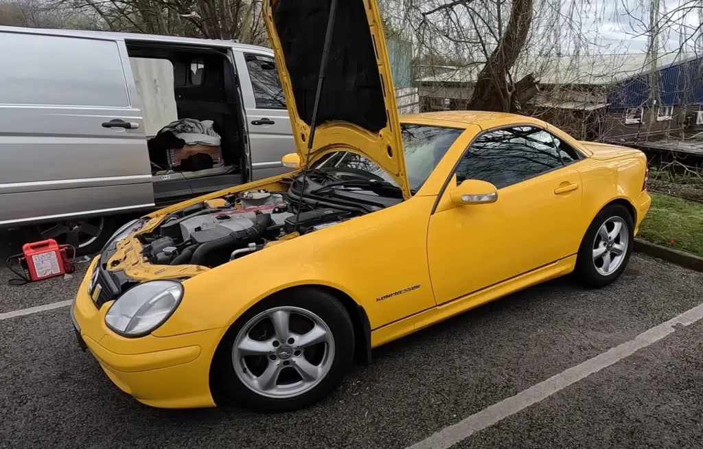 A Mercedes R170 SLK with heated seats, broken springs, and a stripped interior was bought for under $500 and revealed shocking unfinished modifications