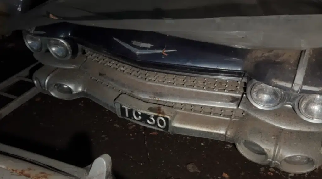 A rare Jaguar E-Type was found in an abandoned farm alongside a classic Cadillac and a Suzuki Jimny, left untouched for decades