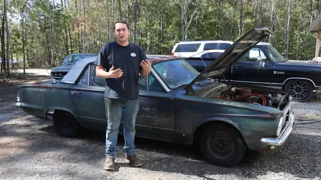 Man-rescues-abandoned-Plymouth-Valiant-from-a-forest