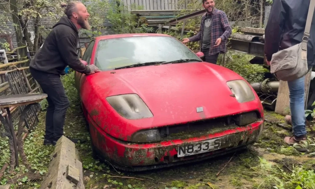 Discover rare cars and automotive treasures hidden within this incredible UK discovery, which stands as the biggest barn find in recent history