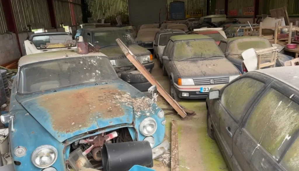 Discover rare cars and automotive treasures hidden within this incredible UK discovery, which stands as the biggest barn find in recent history
