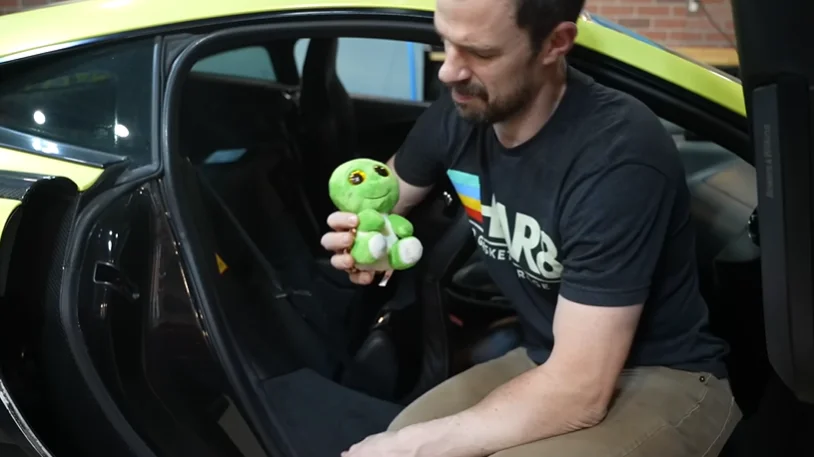 US man who bought a very cheap McLaren after spotting Copart made a 'mistake' finds some odd items inside while rebuilding it