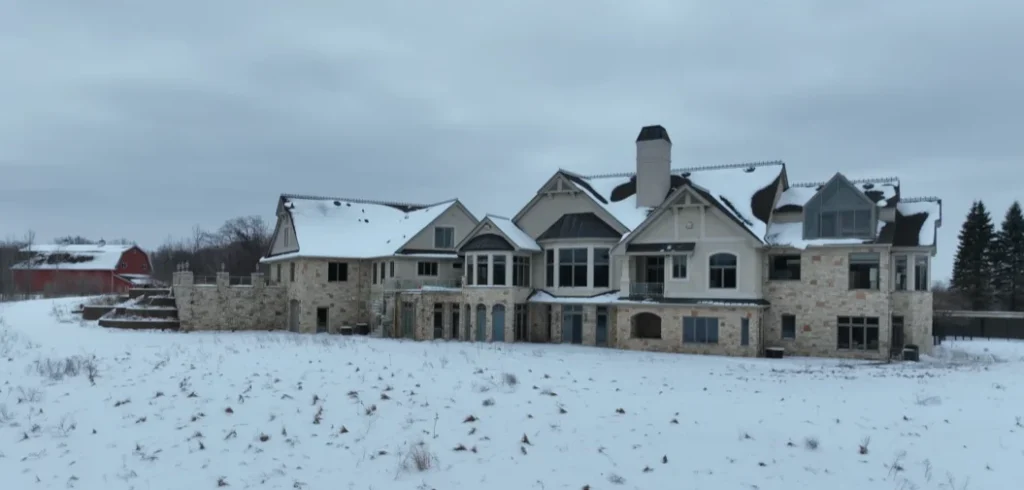 Man explores 17,000-square-foot mega mansion that was once worth $12M but now lies mysteriously abandoned and frozen in time