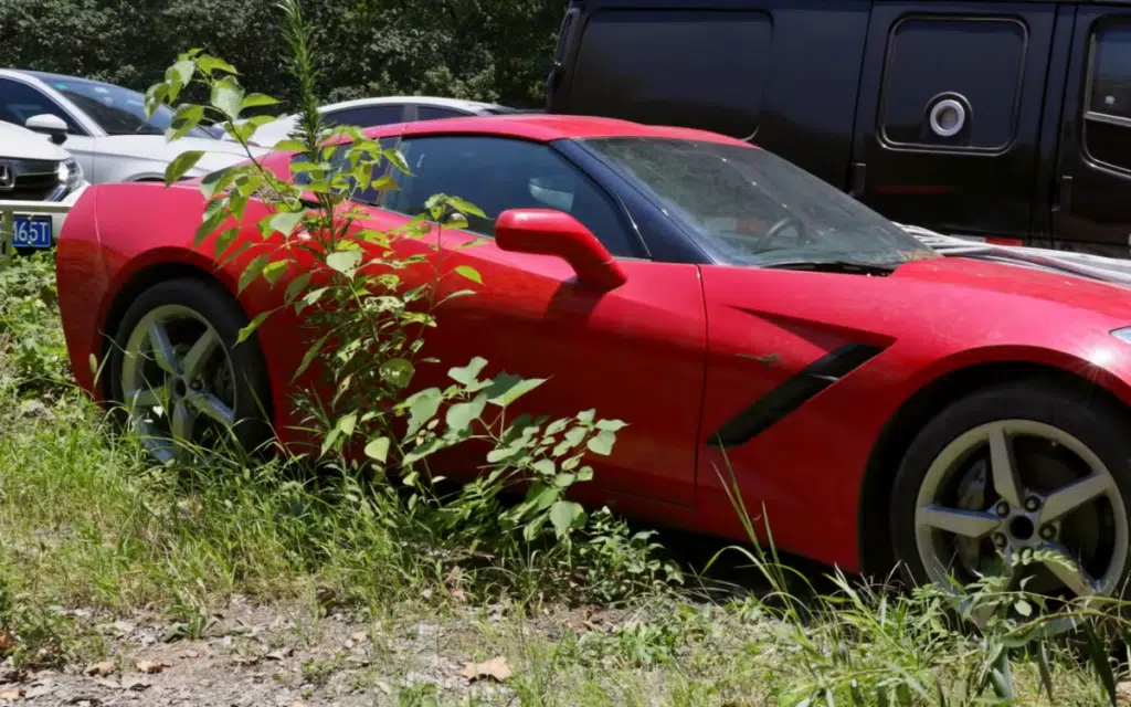 Men managed to get inside supercar graveyard in China and discovered Bentleys Porsches and Aston Martins rotting away