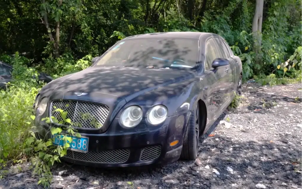 Men managed to get inside supercar graveyard in China and discovered Bentleys Porsches and Aston Martins rotting away