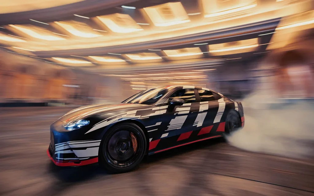 A brand-new Mercedes supercar, the Mercedes AMG GT 4-Door Coupe, has been announced by F1 racer George Russell and actor Brad Pitt in Las Vegas