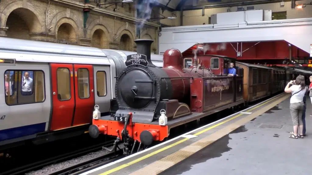 Metropolitan No.1 on the London Underground, alongside the historic tube trains of the network