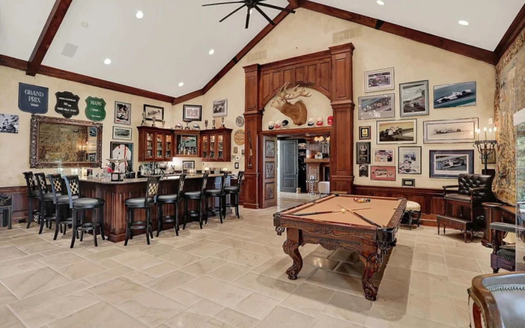 This $11,900,000 mansion once belonged to Michael Andretti and it’s pure horsepower luxury