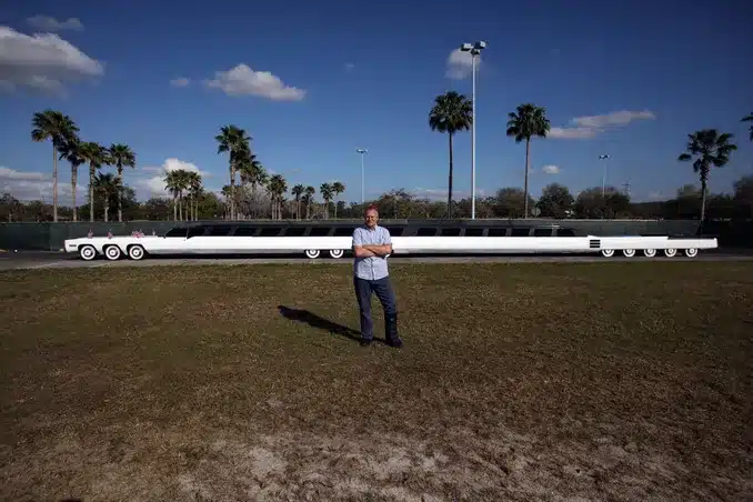Michael Manning with the world's longest car according to the Guinness Book of World Records.