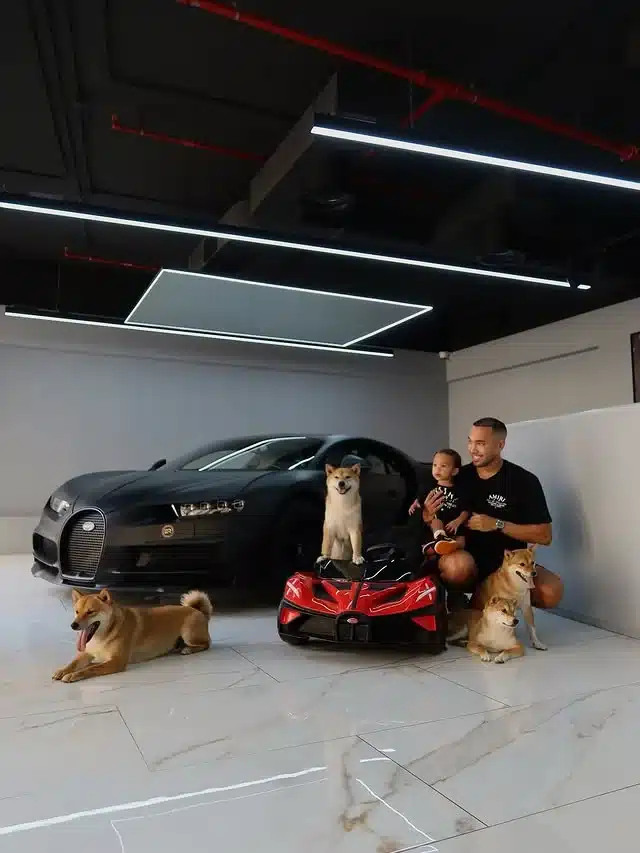 Dubai entrepreneur celebrates 1-of-20 Bugatti Chiron with four Shibas riding in a mini Bugatti