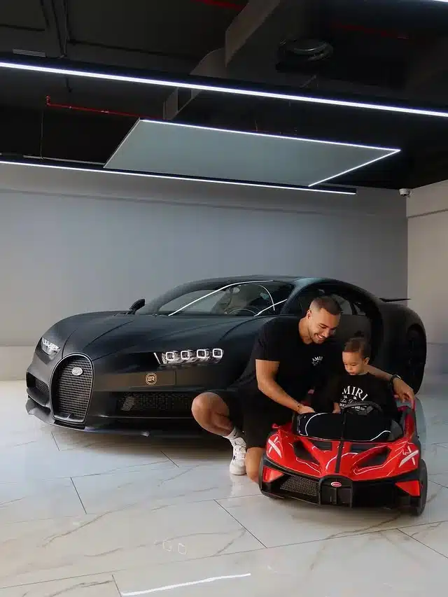 Dubai entrepreneur celebrates 1-of-20 Bugatti Chiron with four Shibas riding in a mini Bugatti