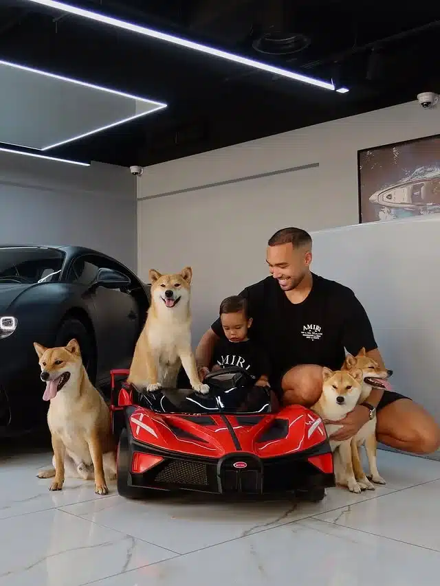Dubai entrepreneur celebrates 1-of-20 Bugatti Chiron with four Shibas riding in a mini Bugatti