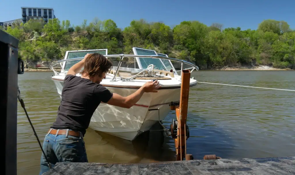 Mississippi man picked up a free boat, faced DIY boat restoration, boat engine problems, and home garage repairs after decades of exposure and decay
