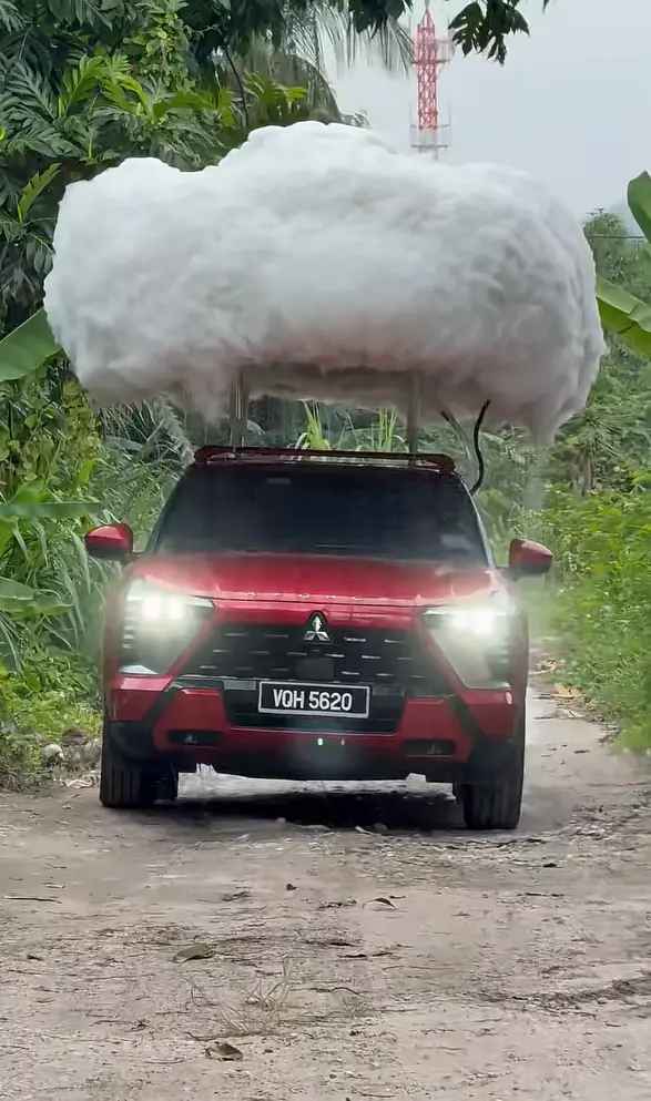 Mitsubishi created its own rain cloud and put it on top of its Xforce car to prove how well it handles wet conditions
