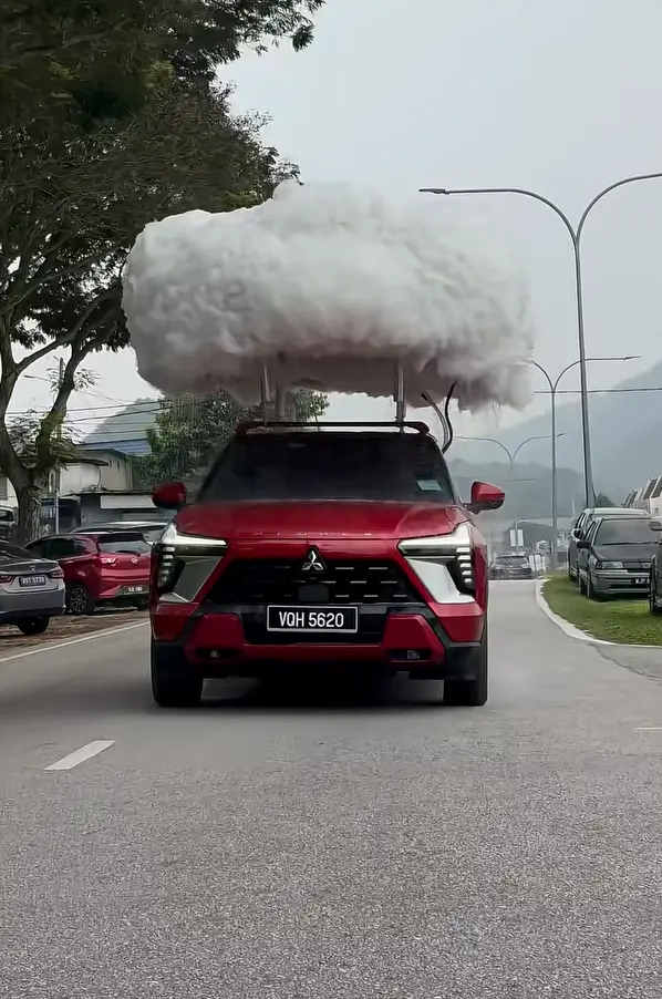 Mitsubishi created its own rain cloud and put it on top of its Xforce car to prove how well it handles wet conditions