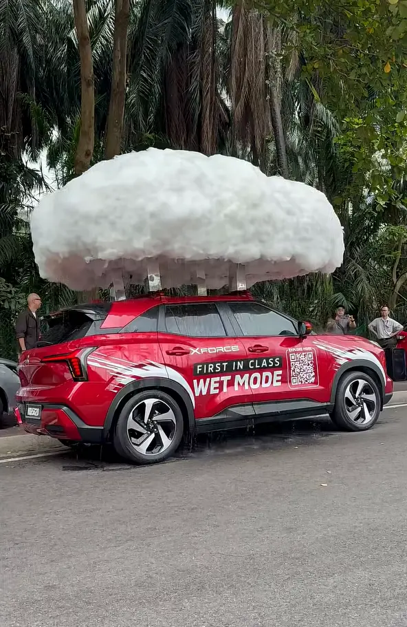 Mitsubishi created its own rain cloud and put it on top of its Xforce car to prove how well it handles wet conditions