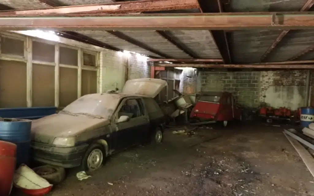 Multiple new unsold cars from the 90s found at abandoned dealership raise more questions than answers