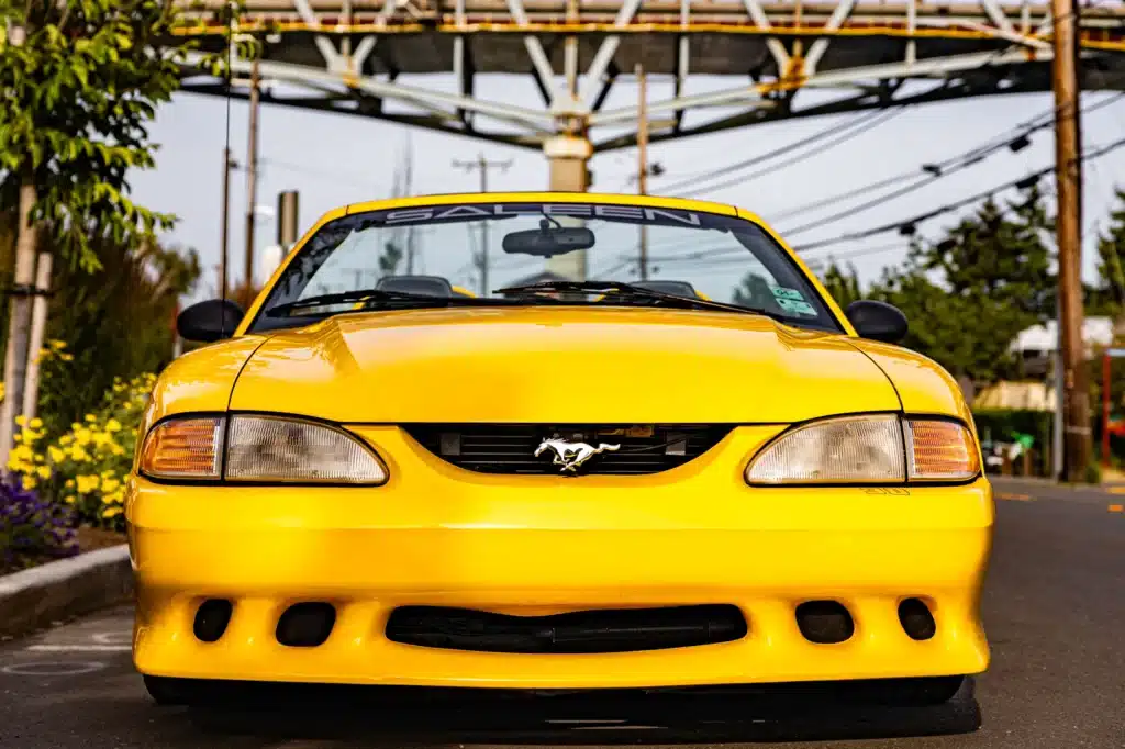 We are selling George Foreman's iconic 1995 yellow convertible Ford Mustang and it's currently less than $40,000