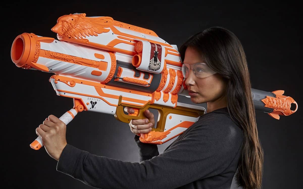 Woman holding the limited edition Nerf Gjallarhorn from the Destiny video game series