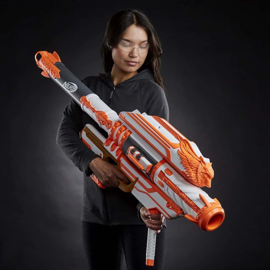 Woman holding the limited edition Nerf Gjallarhorn from the Destiny video game series