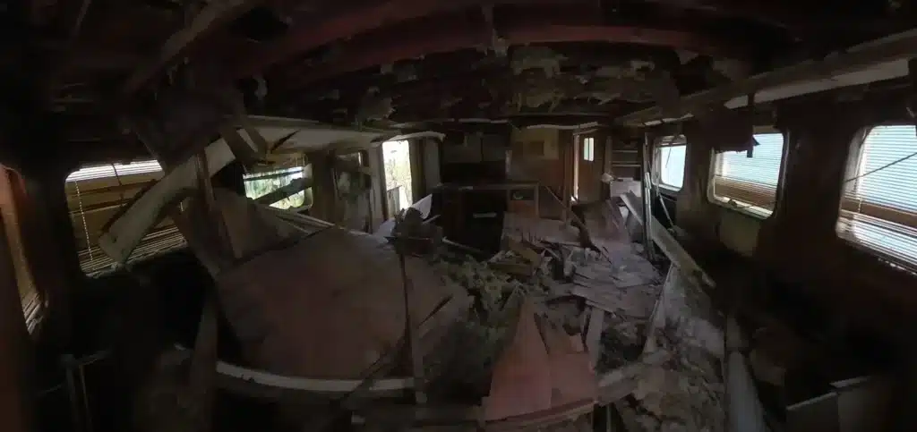 This man kayaked to a long forgotten abandoned yacht in New Jersey and climbed aboard
