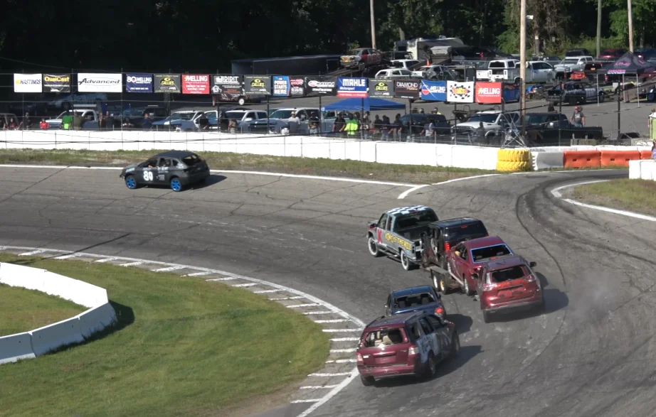 'New sport invented' as cars race round track behind trailer being towed and the first one to park on it wins