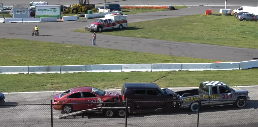 'New sport invented' as cars race round track behind trailer being towed and the first one to park on it wins