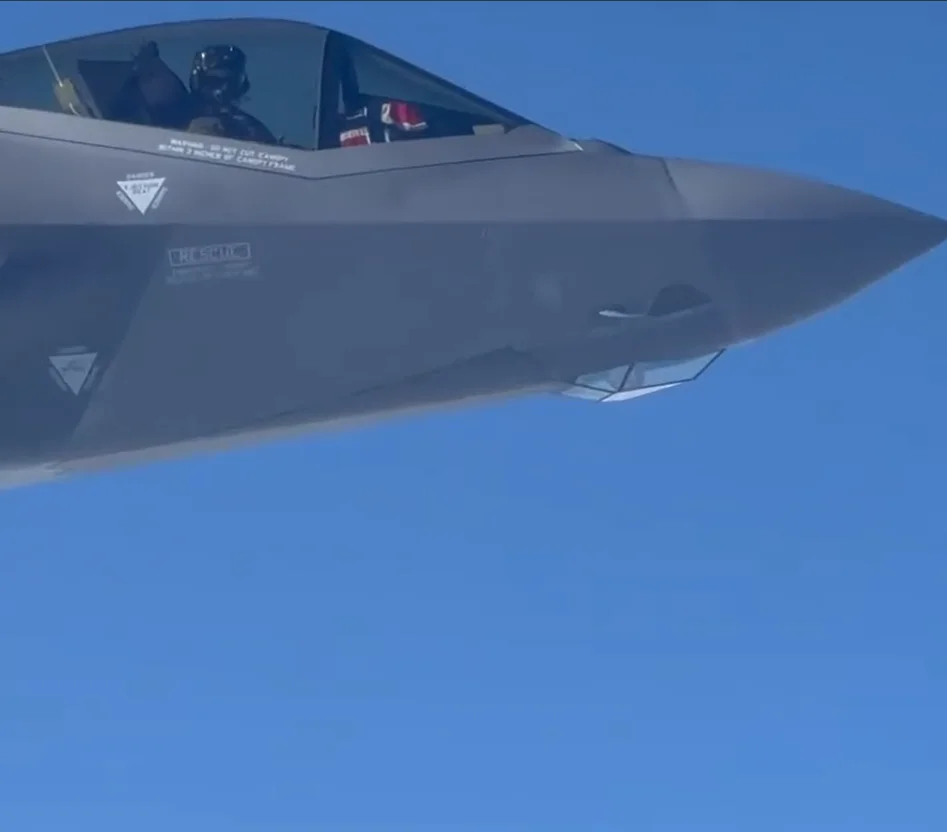 Norwegian football team flying home from World Cup look out of plane window and spot F-35 escorting them