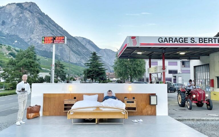 Man staying at the zero star hotel in a gas station forecourt