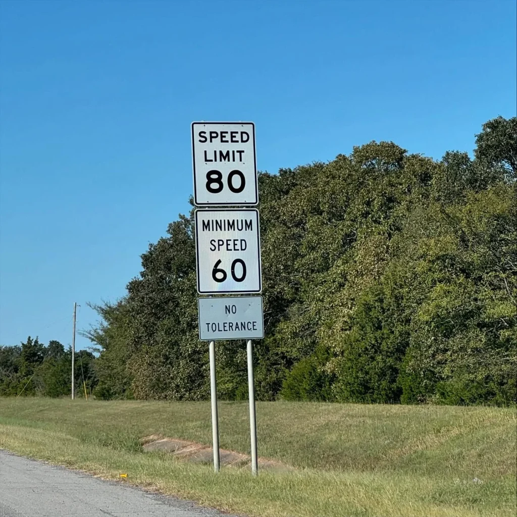 Oklahoma has two different speeding laws and the wording on each sign tells you which you need to follow