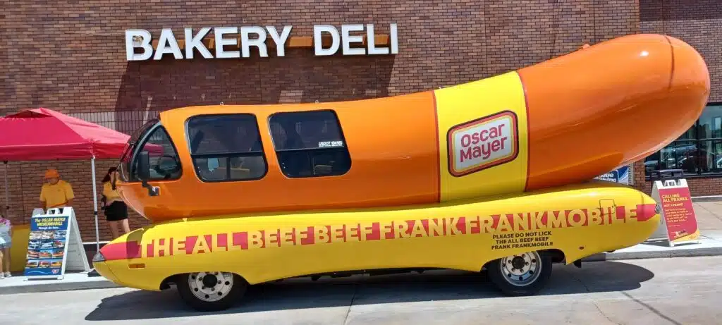 Thousands of Americans compete for chance to drive a 27-foot long 14,050 lbs hot dog