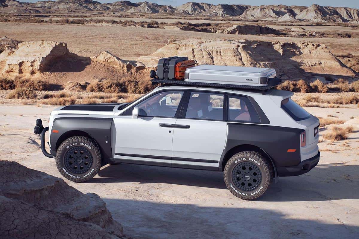 Overlanding Rolls-Royce Cullinan, side profile in the desert