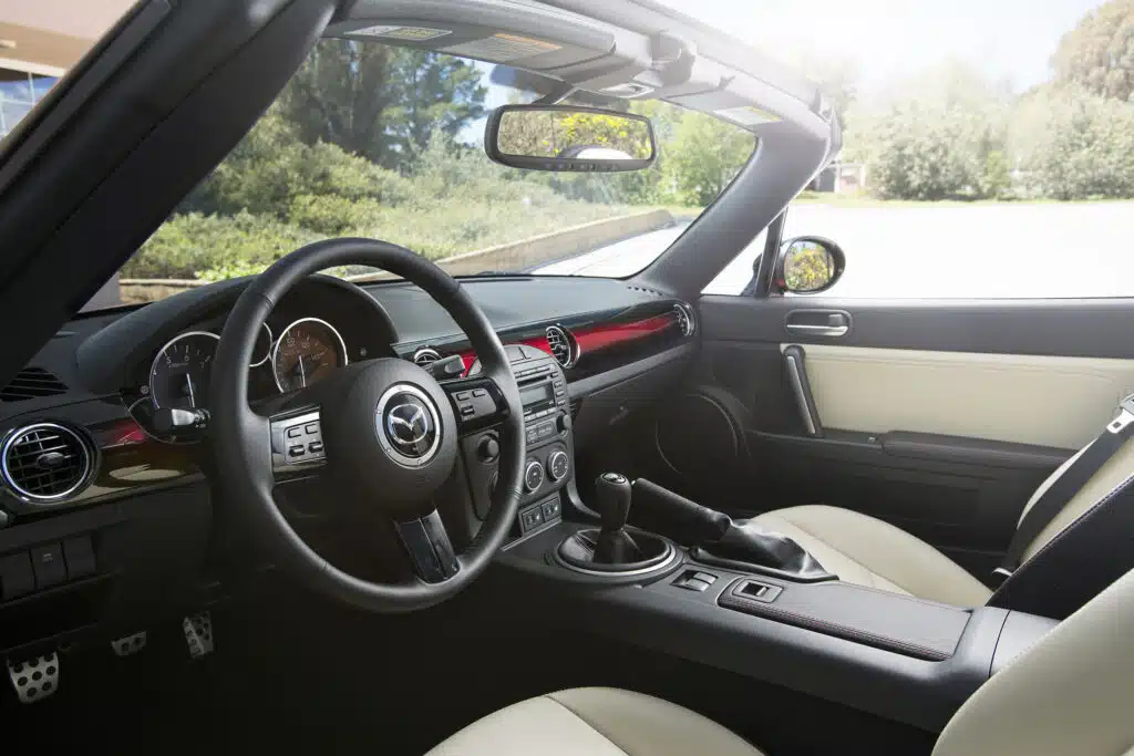 After learning to drive a manual in a Mazda Miata, one man launched a national academy teaching others to master manual transmission cars