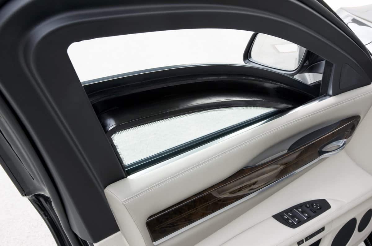 The safety glazing with a polycarbonate layer in the door of the BMW 7 Series High Security.