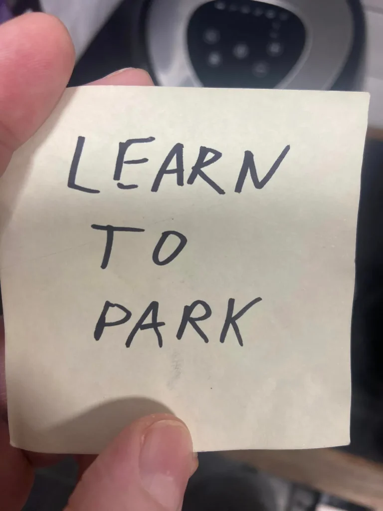 Man asks people to spot the issue with his parking after person leaves bizarre note on his windshield