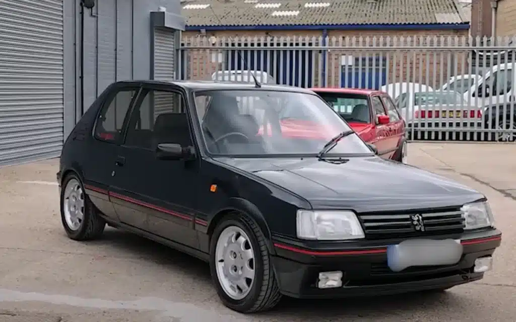YouTuber can't believe the rare classic car his friend’s been hoarding behind garage shutters
