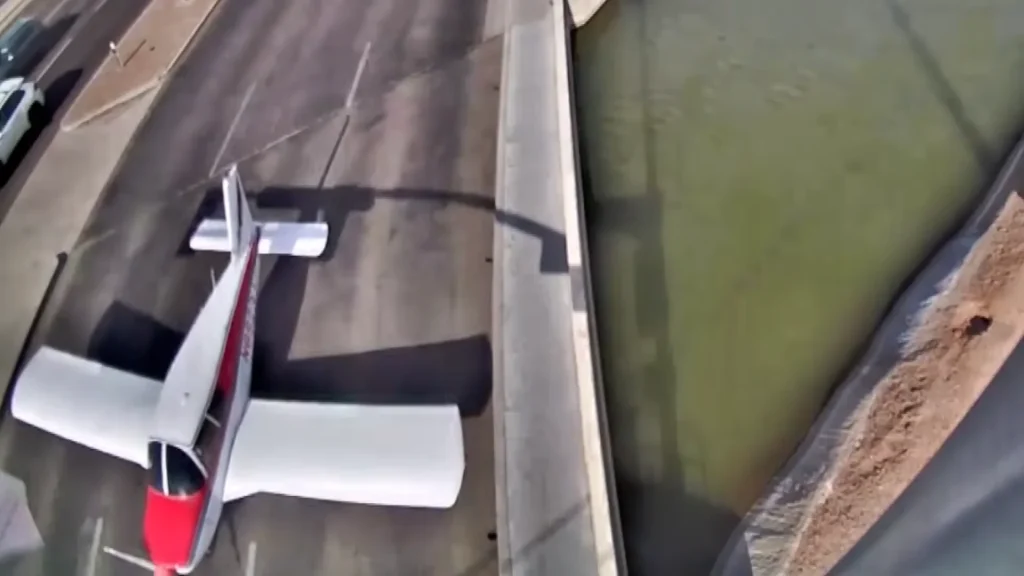 Breathtaking surveillance footage shows small Piper plane miraculously landing on a main street in Arizona