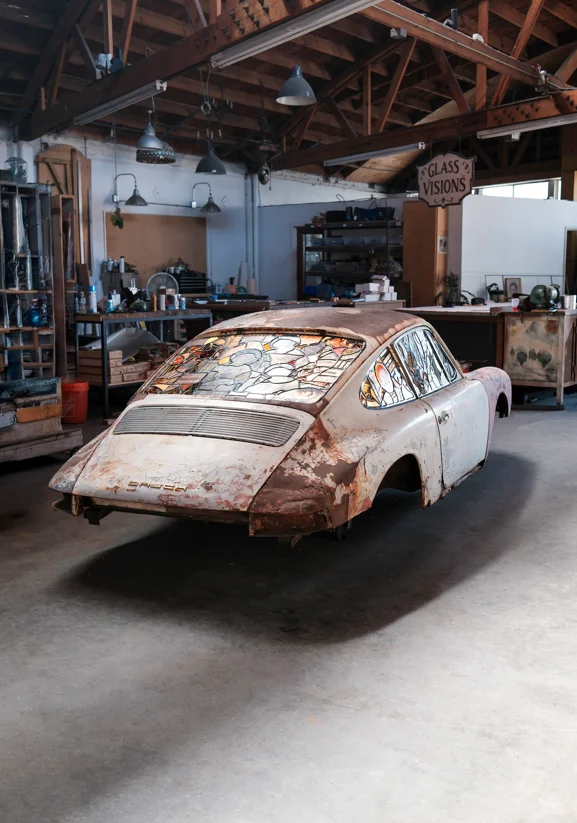 LA man creates art out of abandoned Porsche 911 with stained glass windows