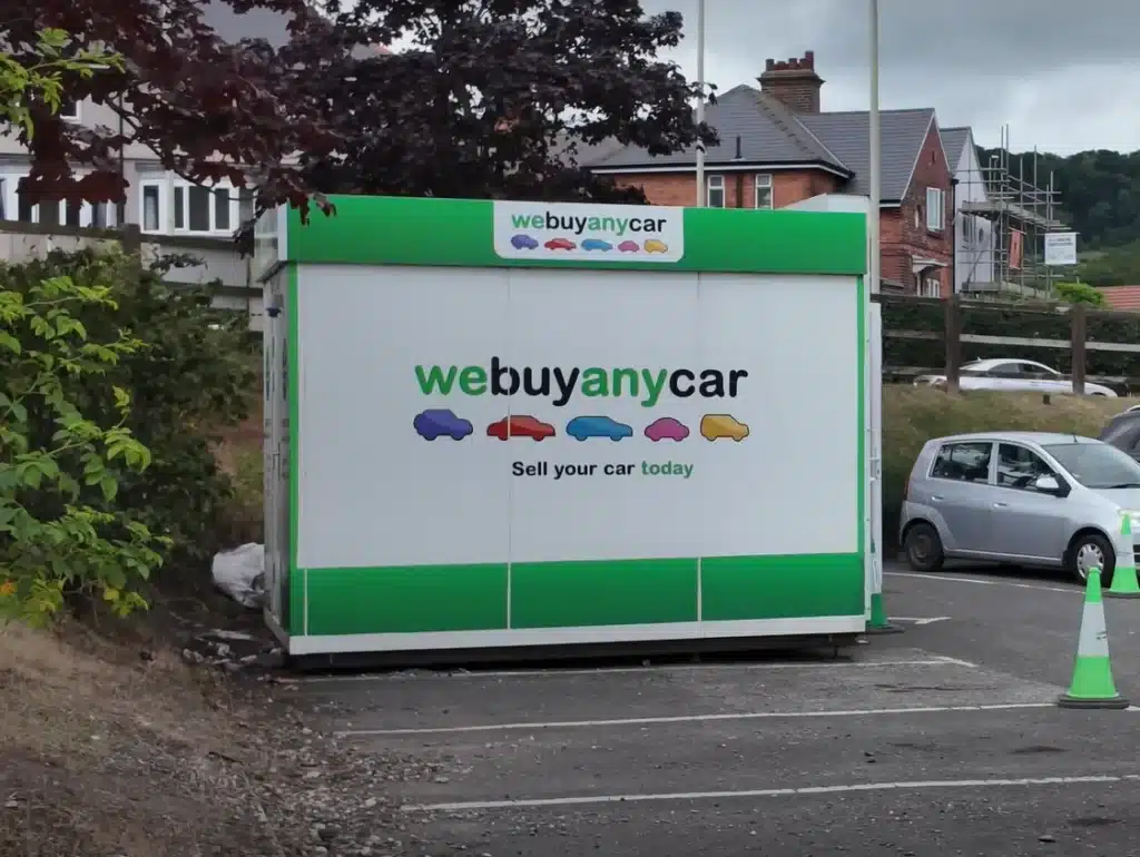 Man who's spent over $10,000 on his Porsche Cayman S gets awkward surprise when he takes it to WeBuyAnyCar