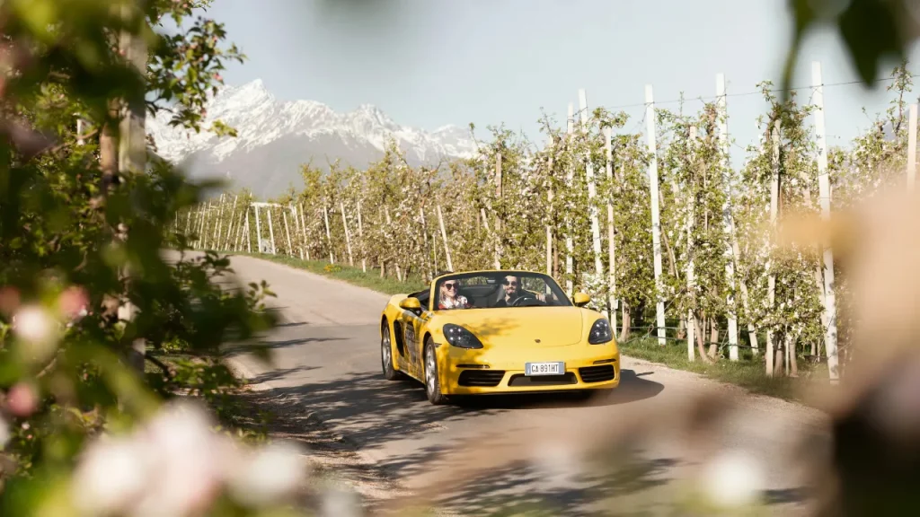 Luxury resort gives guests keys to Porsche convertibles to take out on some of Europe’s most incredible mountain roads